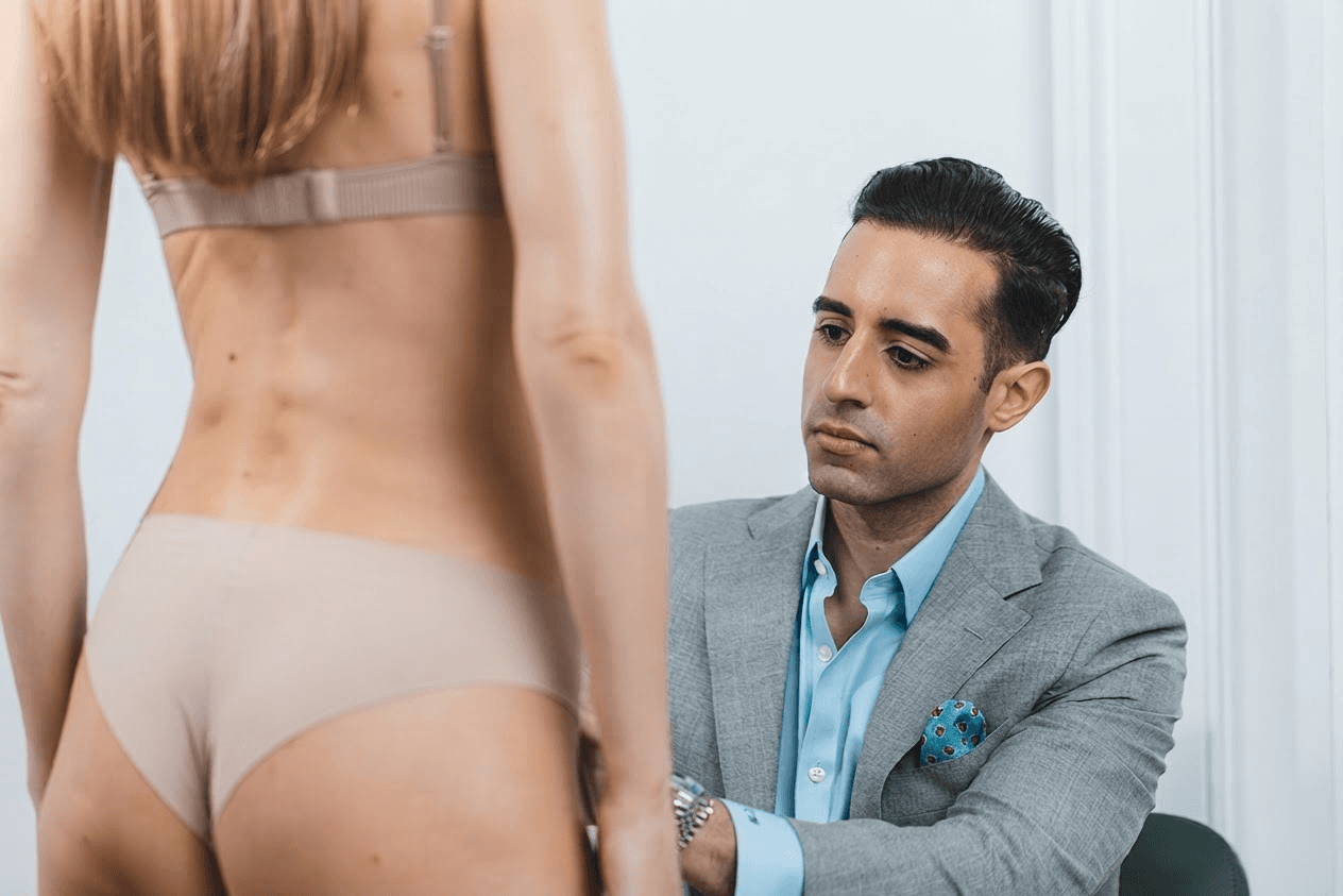 patient during consult for high definition tummy tuck in Manhattan